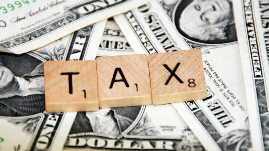 Tax word mark in bold black font on white background.